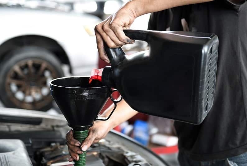 adding engine oil - oil change Maple Ridge BC - Express Care